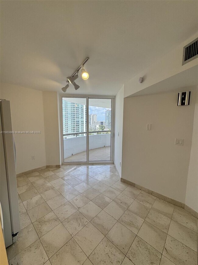 Building Photo - 15645 Collins Ave