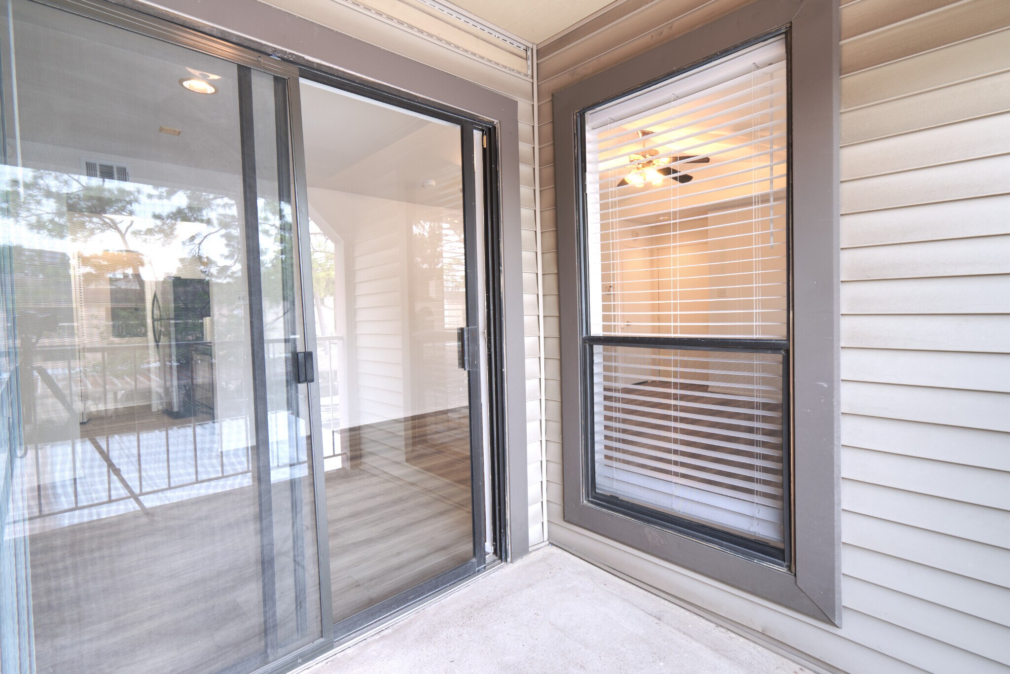 Balcony, facing towards the condo. - 2025 Augusta Dr