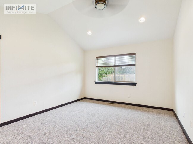 Building Photo - Single-Level 4BR with 3-Car Garage & Fence...