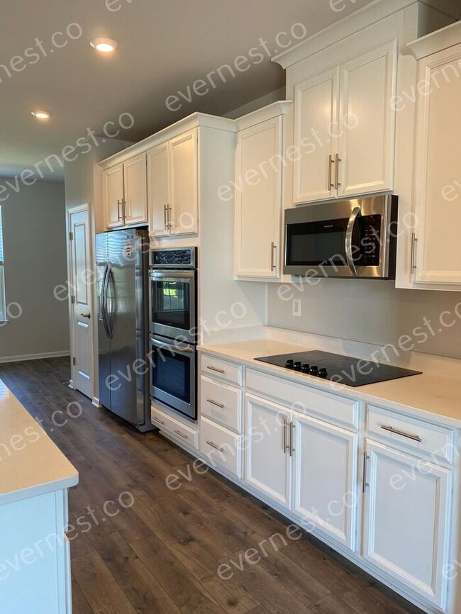 Building Photo - Beautiful 3 Story Townhome - THE LANDING A...