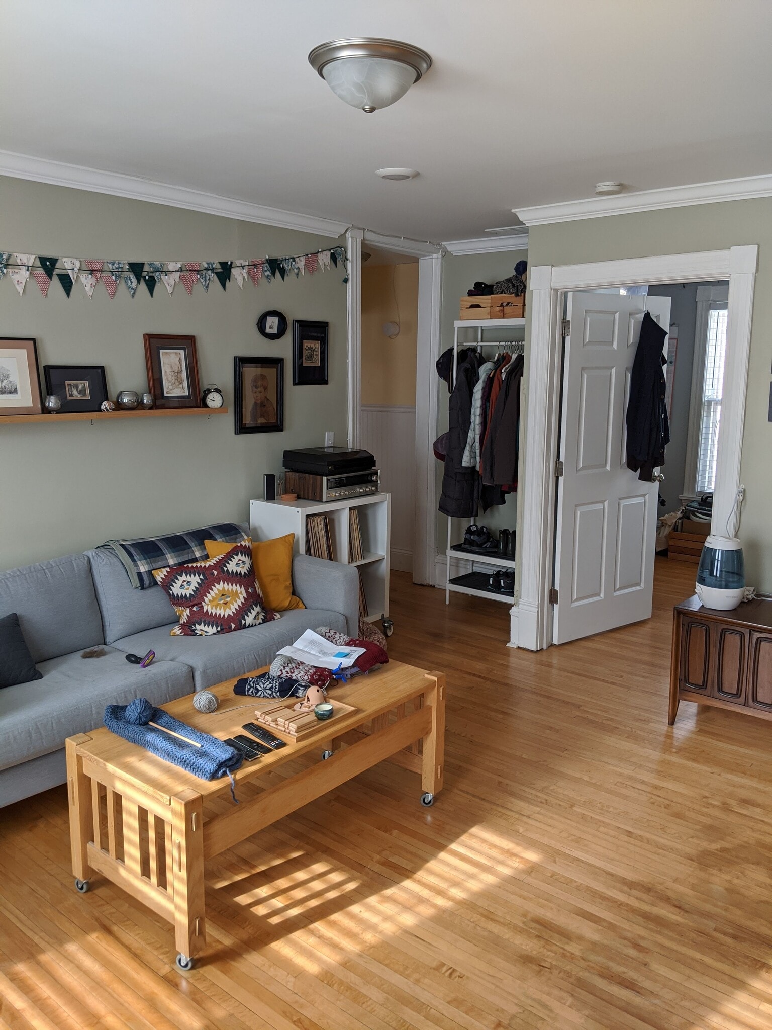 Living room to hallway and middle bedroom. - 1320 Jefferson St NE