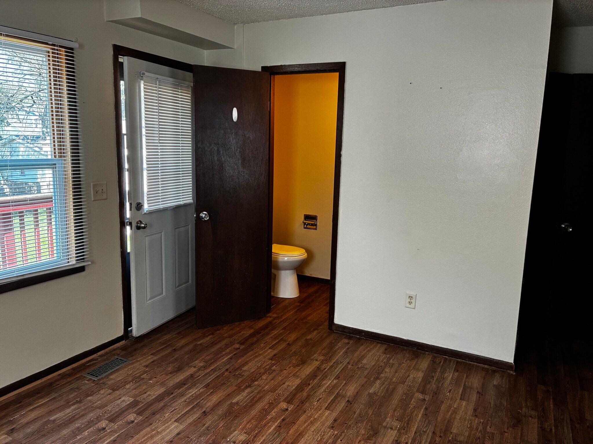 Here you see the half-bath off the kitchen, next to the back door - 1205 Randolph St