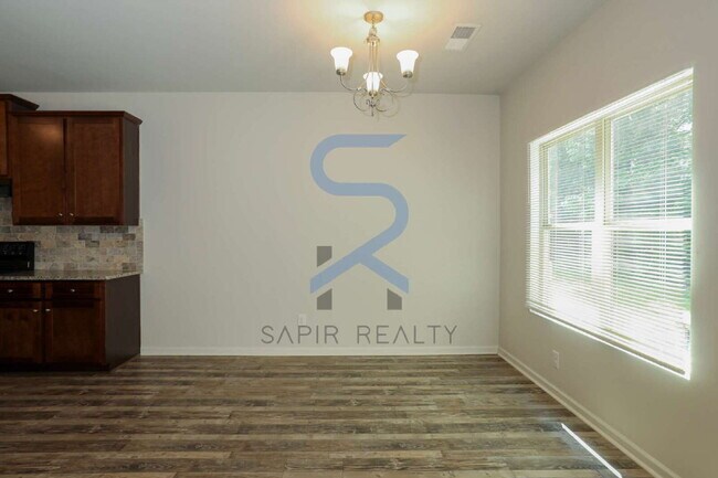 Building Photo - Modern Townhome Living – 3BR/3BA in The Gardens at Lovejoy