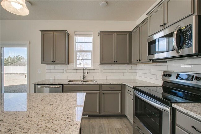 Building Photo - Two Story Townhome Located Off Of Amity & ...