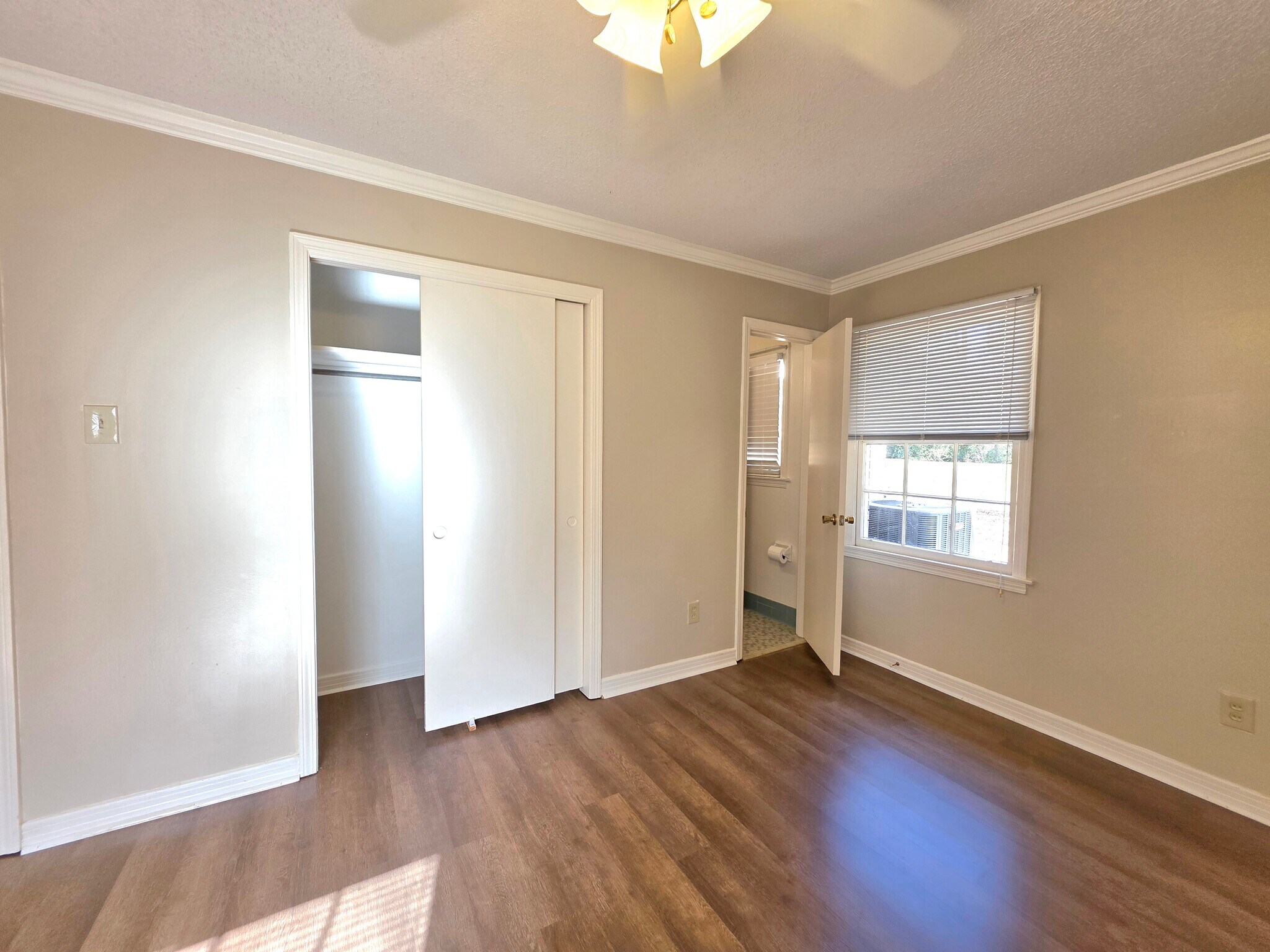 Closet and entry to half bath from the third bedroom - 651 Ynestra Dr