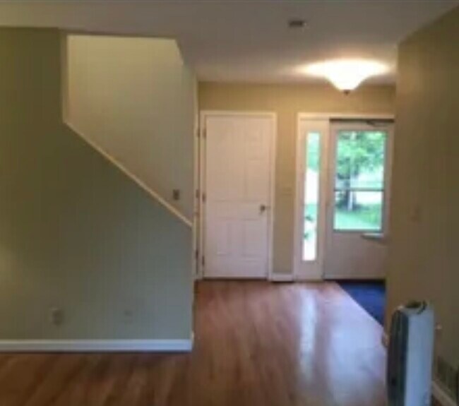 Looking from living room to front foyer and front door - 1212 Williams St