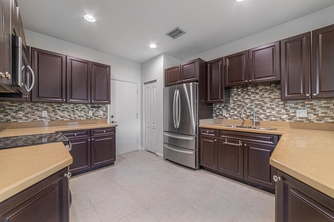 Building Photo - 4109 Macarthur Palm Trail