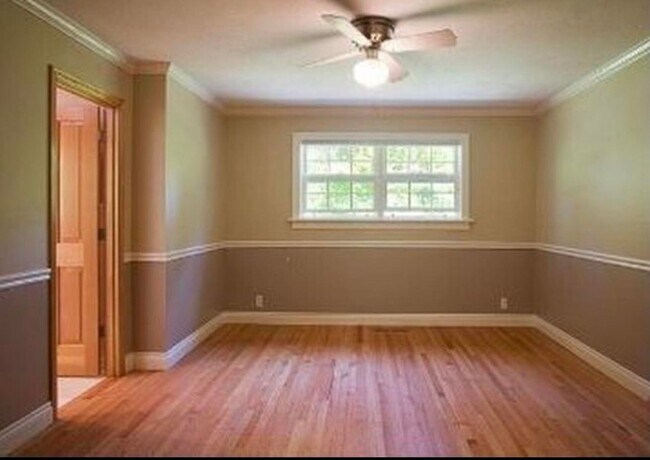 Building Photo - Spacious & light filled home with a garage, backyard, storage & hardwood floors throughout