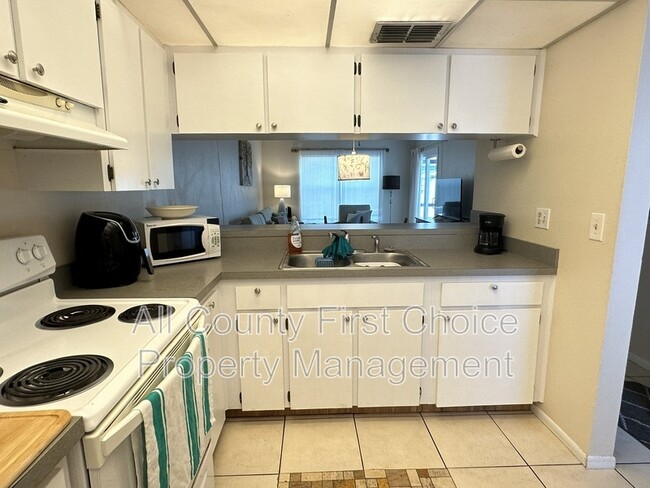 Building Photo - 7315 Parkside Villas Dr