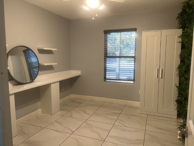 Building Photo - "Charming 4-Bed Oasis with Granite Touch & a Beautiful Pool"