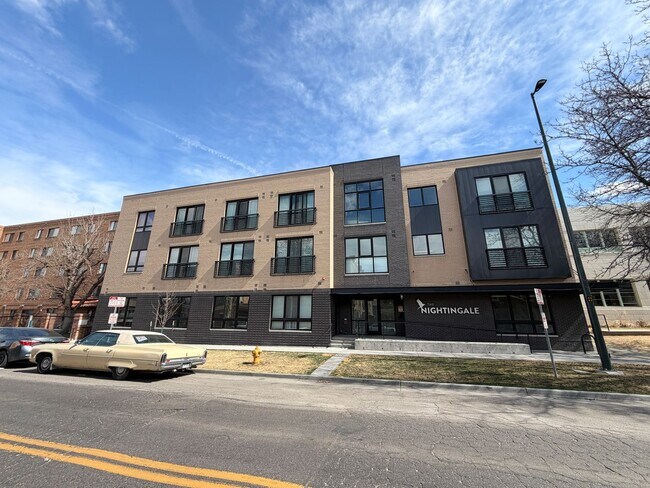 Building Photo - Top-Floor Corner Condo with Downtown Views — Stylish, Pristine, and Steps From Everything