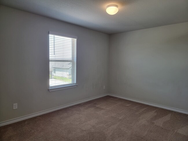 Upstairs second bedroom - 208 Magna Ln