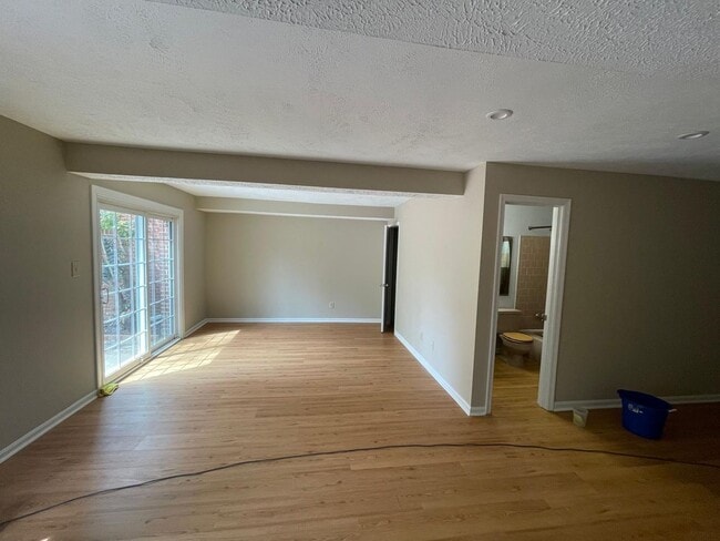 Building Photo - A fully updated Four Bedroom, Three and On...