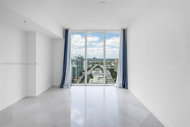 Building Photo - 16699 Collins Ave