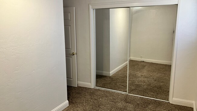 Building Photo - Long term rental with garage and large bac...