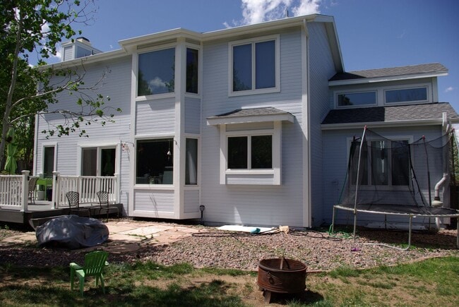 Building Photo - 6bed/4bath oversized 2 car garage fenced in back yard Cheyenne Mountain School District