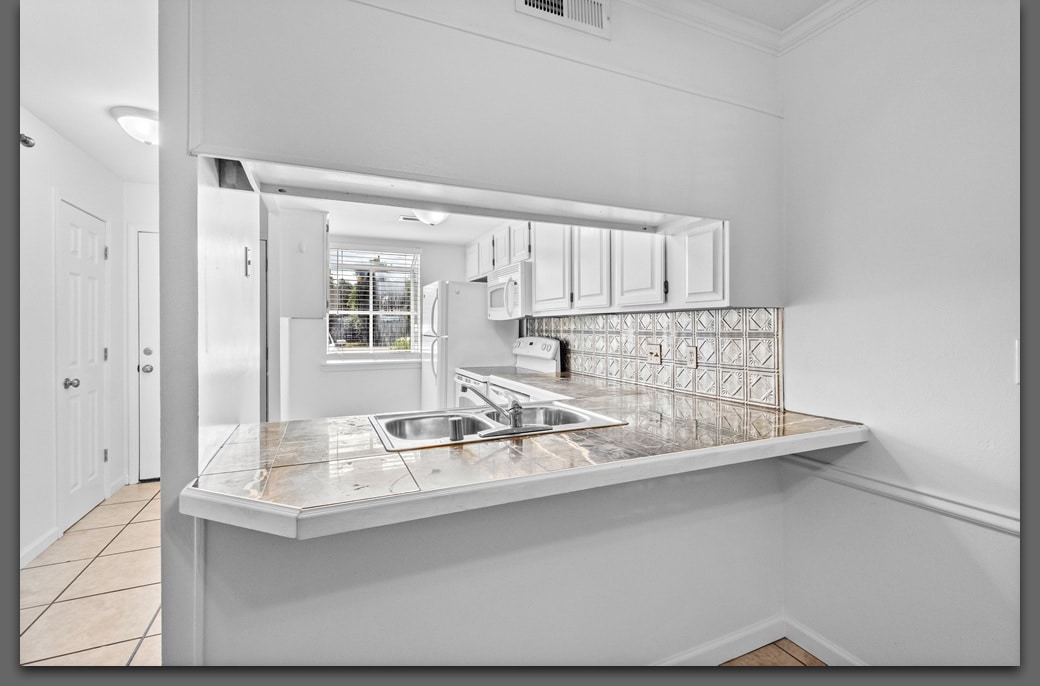 Kitchen looking East - 1519 N Leverett Ave