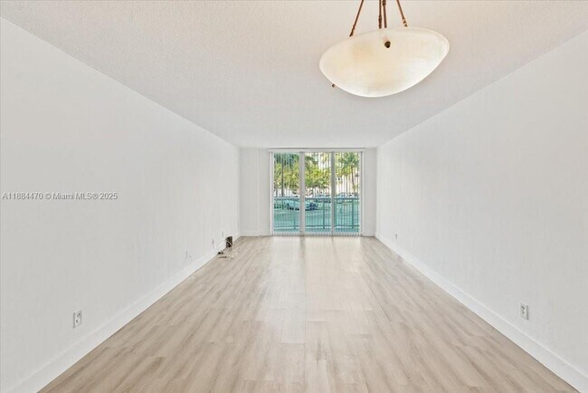 Building Photo - 19380 Collins Ave
