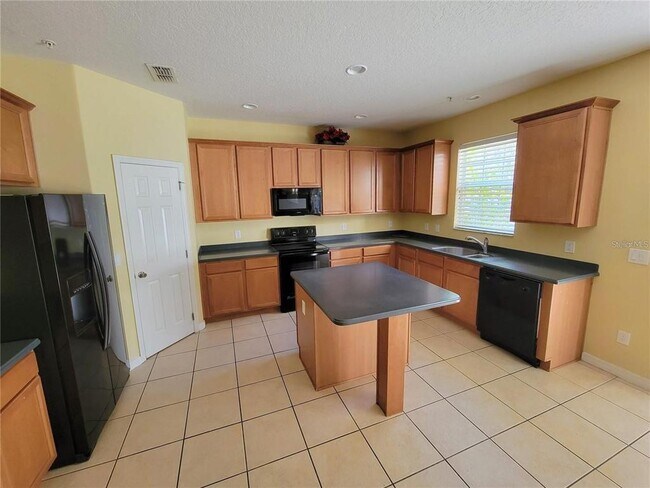 Building Photo - 9722 Moss Rose Way