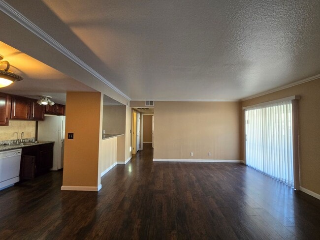 Building Photo - Beautiful 2-Bedroom First-Floor Condo in a Guard-Gated Community