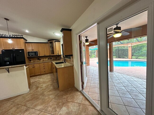 Building Photo - Tranquil Lakefront Living in the Heart of ...