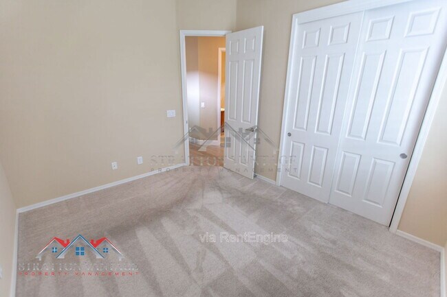 Building Photo - 5908 E Bramble Berry Ln