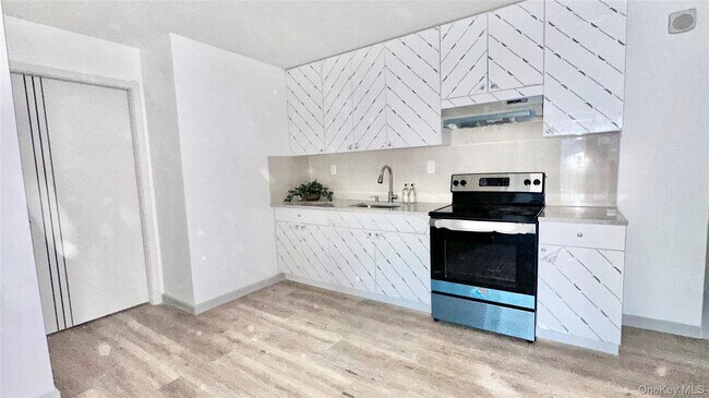 Building Photo - 70-65 Queens Blvd