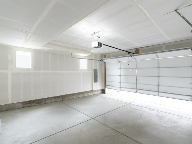 Oversized 2-car garage: 2 remotes, outdoor keypad, app control, alerts - 2863 W 69th Ave