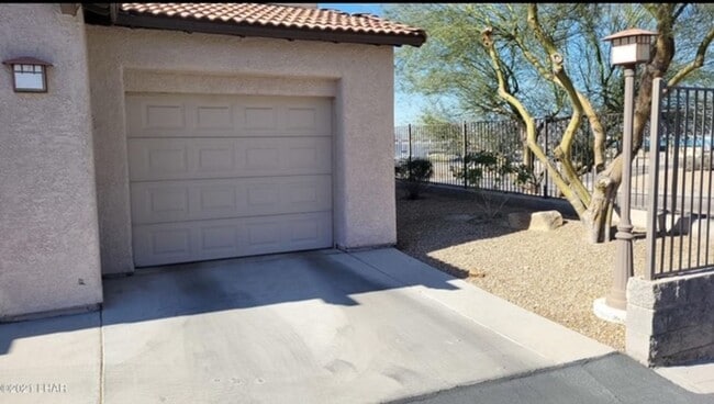 Building Photo - Long term - unfurnished ground floor condo