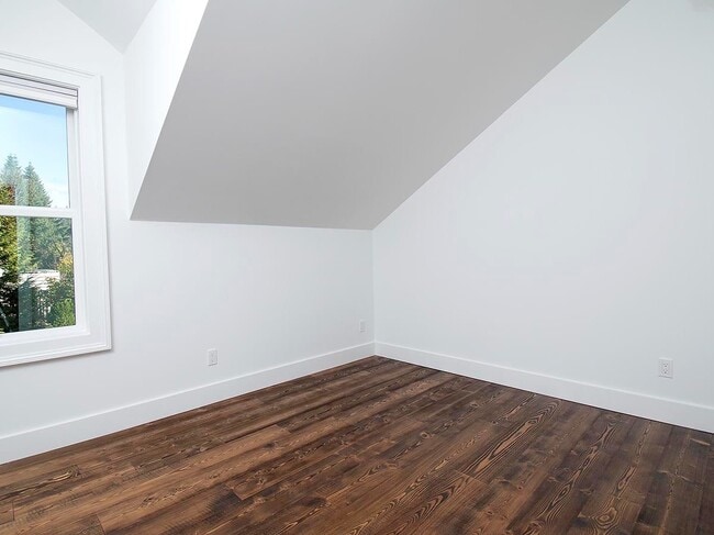 Building Photo - Expansive Loft-Style Carriage House in Private Haller Lake Estate