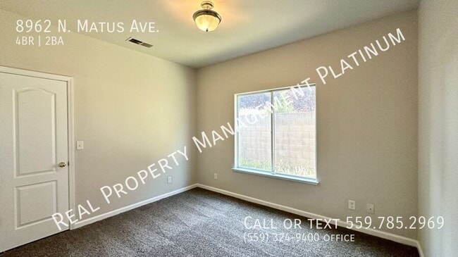 Building Photo - 8962 N Matus Ave