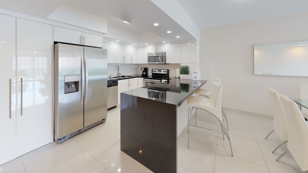 Building Photo - 19370 Collins Ave