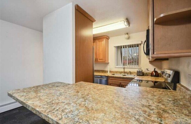 Building Photo - Charming 2BR Condo in Denver