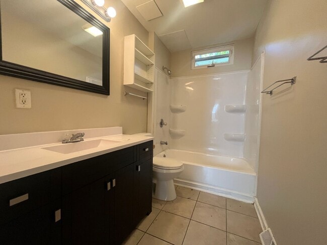 Building Photo - This spacious 3-bedroom lower level duplex...