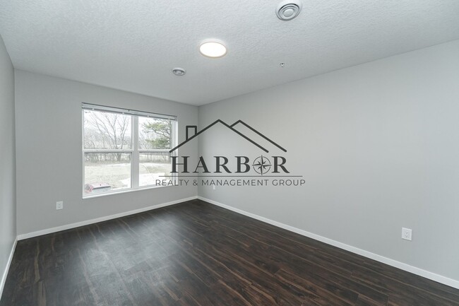 Building Photo - Brand NEW Caroline Apartments -Premier Uni...