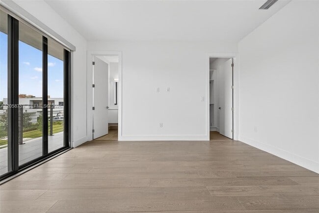 Building Photo - 16709 Botaniko Dr N