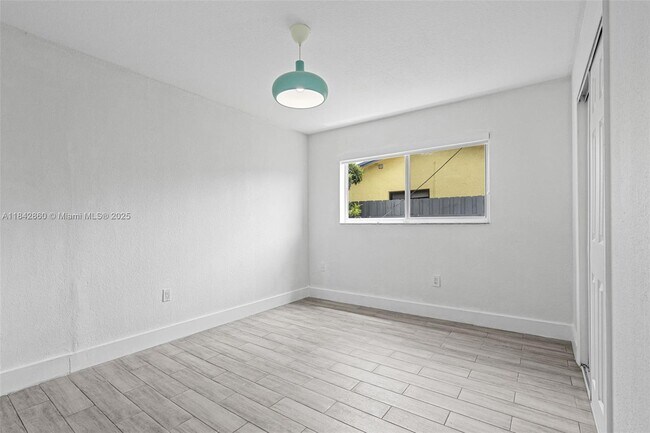 Building Photo - 9021 NW 7th Ct