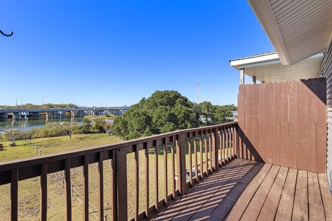 Building Photo - Beachside Living with Beautiful Bay Views