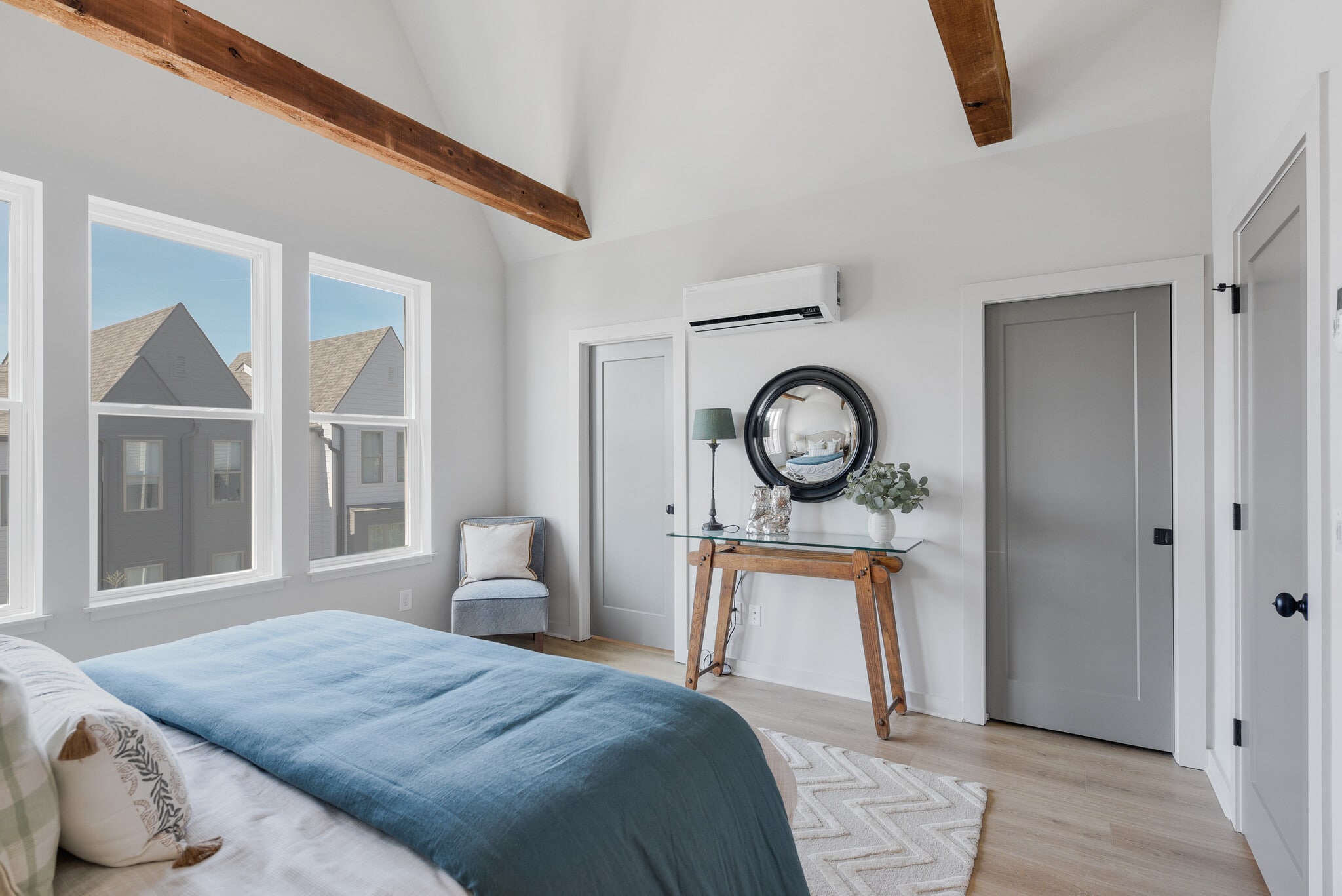 Wake up to sunlight pouring through three oversized windows in this spacious master suite. - 358 E Village Ln