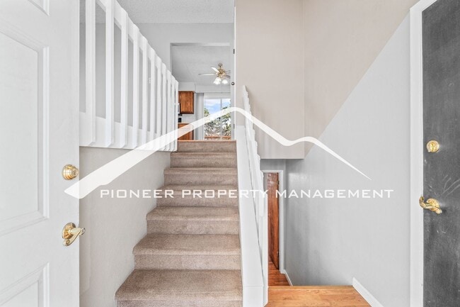 Building Photo - Spacious Split-Level Home in D20 with Mountain Views, 2 Car Garage, Fenced Yard and AC!