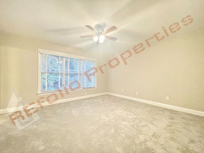 Building Photo - Freshly Painted with New Carpet and Wood F...