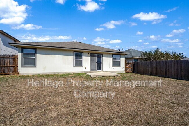 Building Photo - 4935 Dahlia Terrace