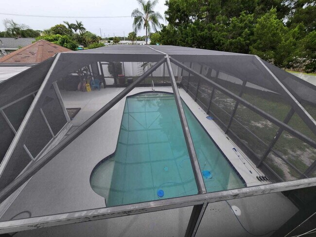 Building Photo - 5-Bedroom Pool Home with 2 Full Baths - Spacious 2373 Sq Ft Home in Englewood's Prime Location!"