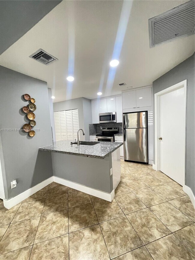 Building Photo - 18310 NW 68th Ave