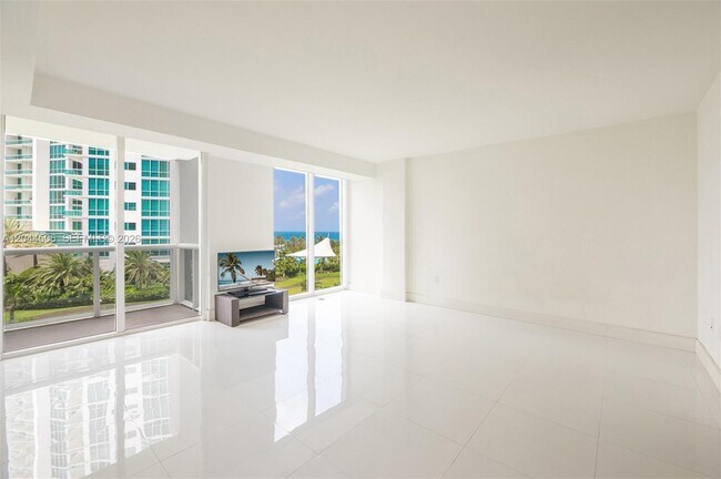 Building Photo - 10275 Collins Ave