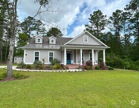 Building Photo - Beautifully appointed furnished 4 bedroom ...