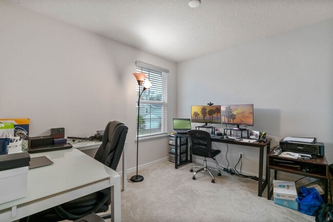 Building Photo - Water Front Home- 4 Large Bedrooms-3 baths Gated Community Call Sheila Campbell 407-687-7900