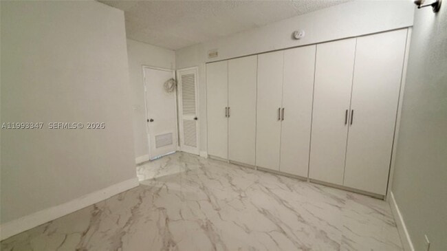 Building Photo - 19380 Collins Ave