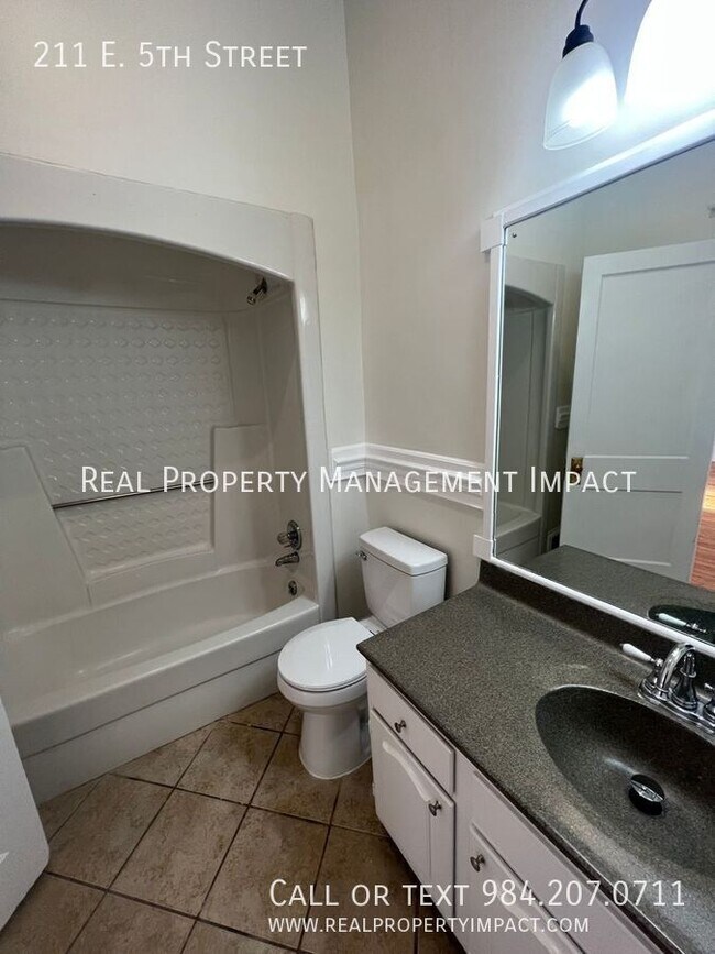 Building Photo - 211 E 5th St