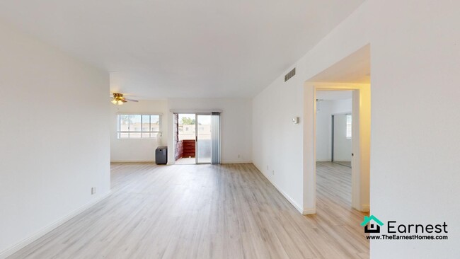 Building Photo - 2 + 2 Spacious 2-Bedroom Condo with Top-Ti...